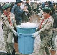 The boy scouts put trash in order